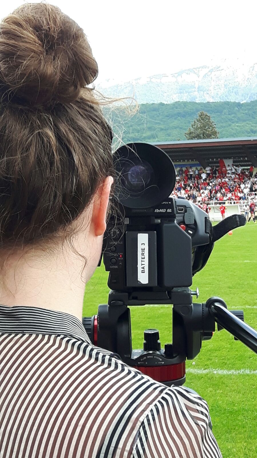 Chloe Darnaud behind a broadcast camera — journalism years